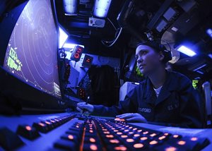 Sailor observing radar screen